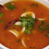 Parihuela · Tomato-based Peruvian seafood soup.