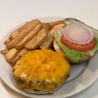 McKenna’s Famous 1/2 Pound Burger · 1/2 lb Beef Patty w/ Lettuce, Tomato, Onion, Pickle. Served with Steak Fries