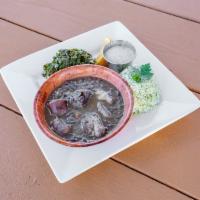 Feijoada · Traditional Brazilian black bean stew, with pork, sausage, carne seca. Served with white ric...