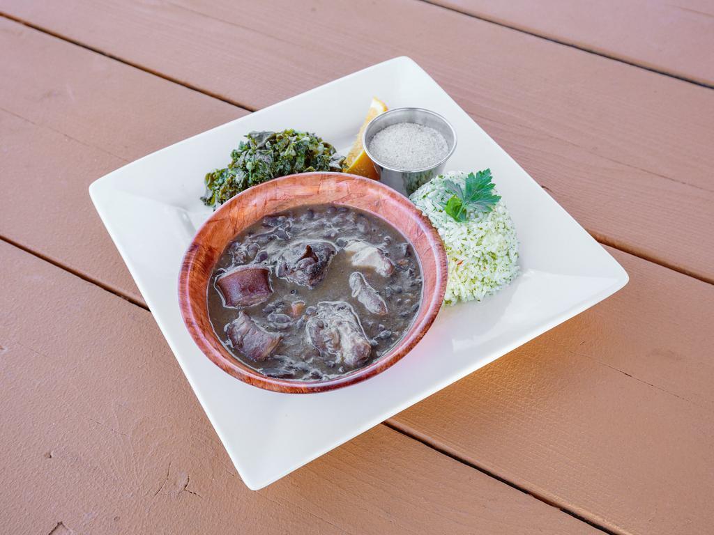 Feijoada · Traditional Brazilian black bean stew, with pork, sausage, carne seca. Served with white rice, braised greens, farofa and orange slice.