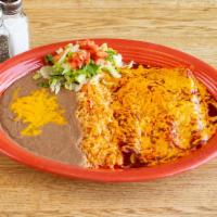 7. Uxmal Platter · 2 cheese enchiladas smothered in cheese and our fresh made enchilada sauce. Served with rice...