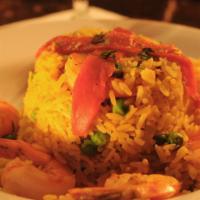 Arroz con Camarones · Saffron rice with shrimp.