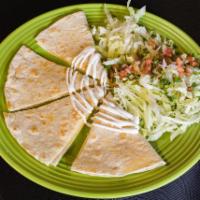 Quesadillas · Flour tortilla filled with cheese and a choice of meat. Served with lettuce, pico de gallo, ...