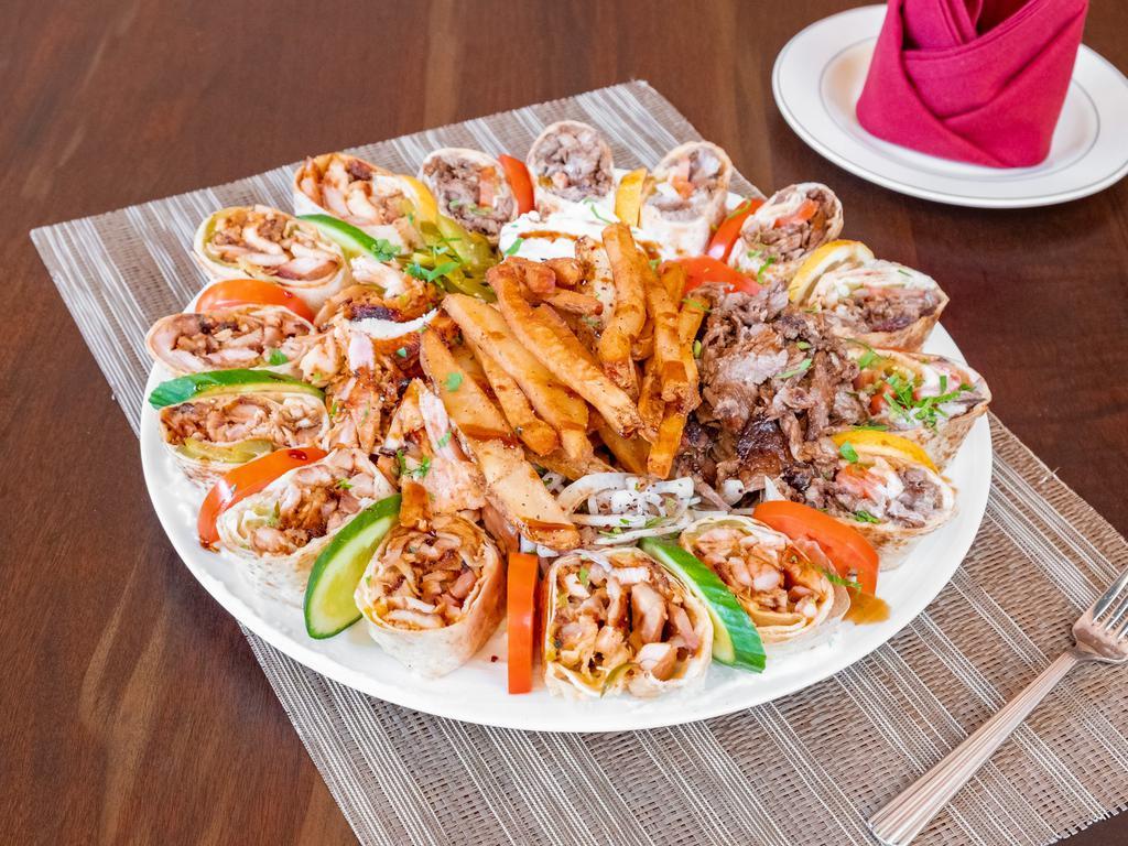 Meat Shawarma · Roasted thin slices of meat, served with french fries and tahini dip.