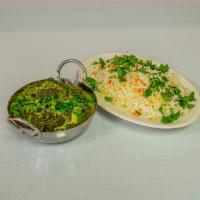 Saag Paneer · Homemade cheese with spinach and fresh spices.