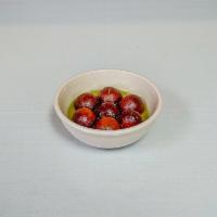 Gulab Jamon · Sweet milk balls soaked in a sweet syrup.