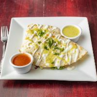 Chicken Quesadilla · Grilled chicken, lettuce, tomato, chopped onions, guacamole sauce, and ground cheese.