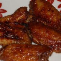 A3. Chicken Wings with Garlitc Sauce Special · 4 pieces. Hot and spicy.