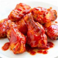 A19. BBQ Chicken Wings Special · Cooked wing of a chicken coated in sauce or seasoning.
