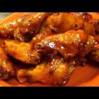 A20. Honey Chicken Wings Special · Cooked wing of a chicken coated in sauce or seasoning.