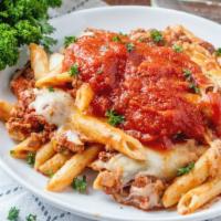 BAKED ZITI · Penne pasta cooked al dente with our hearty marinara sauce, ricotta and mozzarella cheese.