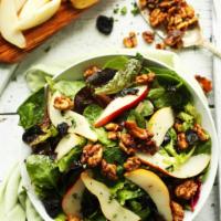 PEAR SALAD · Spinach, pears, craisins, feta, caramelized walnuts, house-made balsamic vinaigrette. Vegeta...