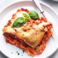 LASAGNA · Layers of fresh noodles, ground beef, and ricotta topped with mozzarella.