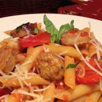 PENNE ABRUZZO · Italian Sausage, roasted garlic & bell peppers in a plum tomato sauce topped with basil & pa...
