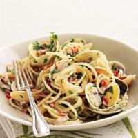 Spaghetti with Clams · Fresh clams steamed open, sauteed with fresh herbs, olive oil and garlic.