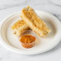 Spring Roll · Bacon, mac and cheese, spices, uncooked tortillas, salt, and pepper. Served with tomato sauce.