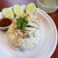 Khao mun gai · slow poached chicken w. chicken fat rice, chicken
soup,served w. ginger, chili,tauchu dippin...