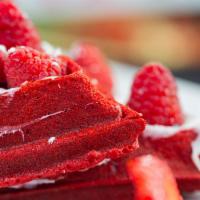 Rissas Ruby Red Velvet · Red velvet waffles drizzled with our special cream cheese frosting. 