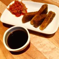 Seasoned Tofu · Crispy tofu dusted in house spices, house kimchi, dipping sauce. Gluten free.