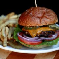 The House Burger · Our blend of brisket, chuck, and wagyu plate are ground and pressed in house. Served with le...