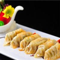 Gyoza · Pan fried vegetable dumpling or pork dumpling.