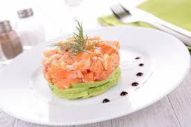 Salmon Tartar · Avocado, fresh salmon and caviar on top with yuzu sauce.