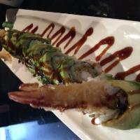 Phoenix Roll · Tempura shrimp, cucumber inside avocado on the top with eel sauce.