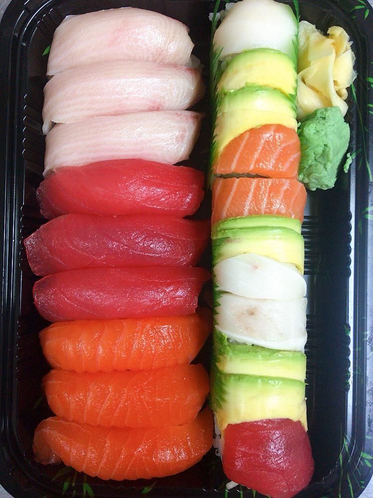 Tri-Color Sushi · 3 pieces tuna, 3 pieces salmon, 3 pieces yellowtail sushi
 with a rainbow roll.