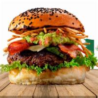 Mexican Burger · Angus beef, Mexican cheese, ketchup, mustard, house dressing, tomatoes, onion, shoestring, 