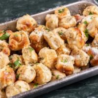 6 Piece Garlic Knots · Bread, topped with garlic and olive oil or butter, herb seasoning, baked to perfection. Melt...