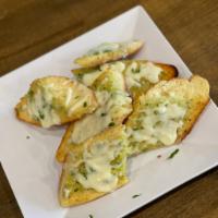 Garlic Bread with Cheese · Freshly baked toasted bread with delicious garlic and melted mozzarella cheese 