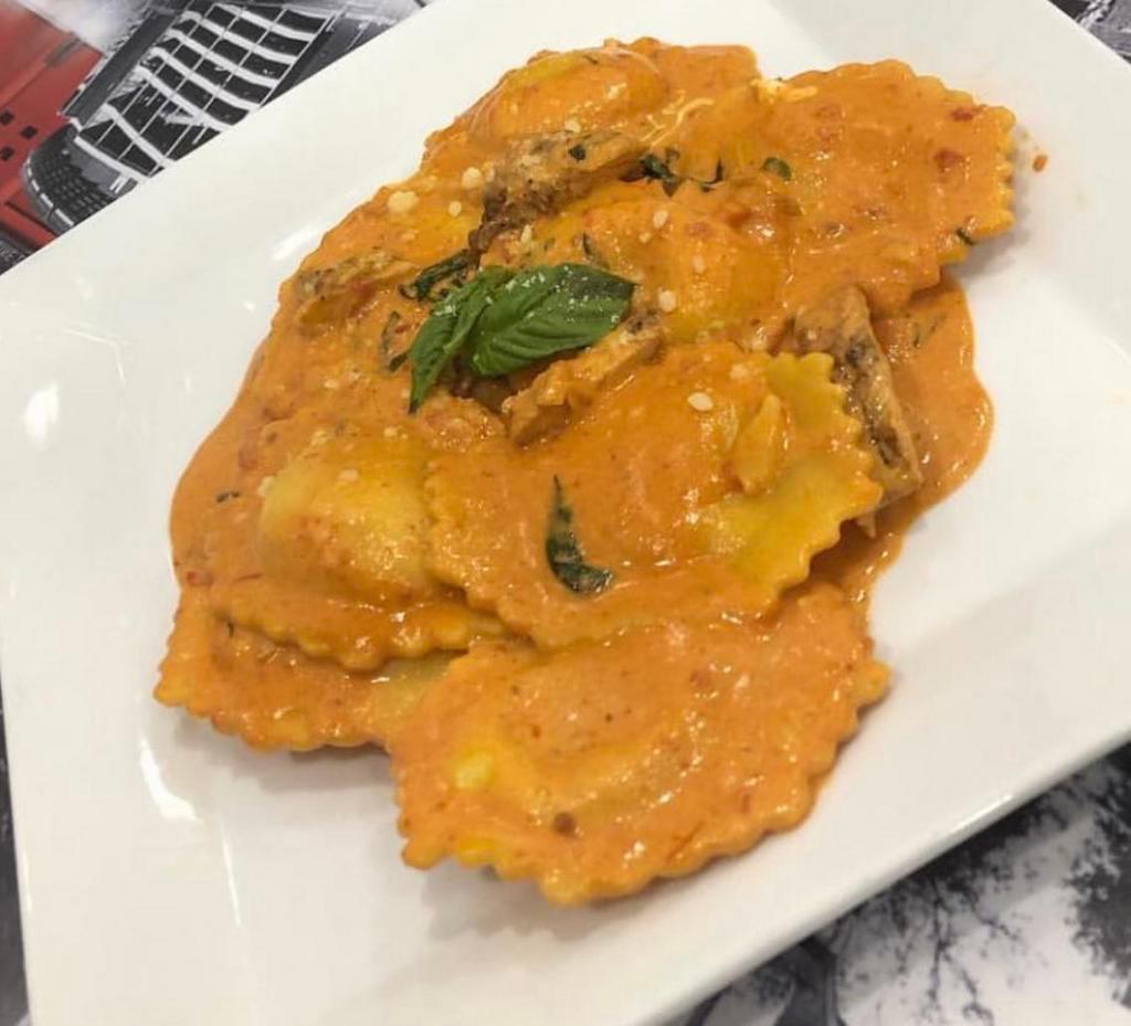 Cheese Ravioli · Massive ravioli filled with cheese and your choice of sauce