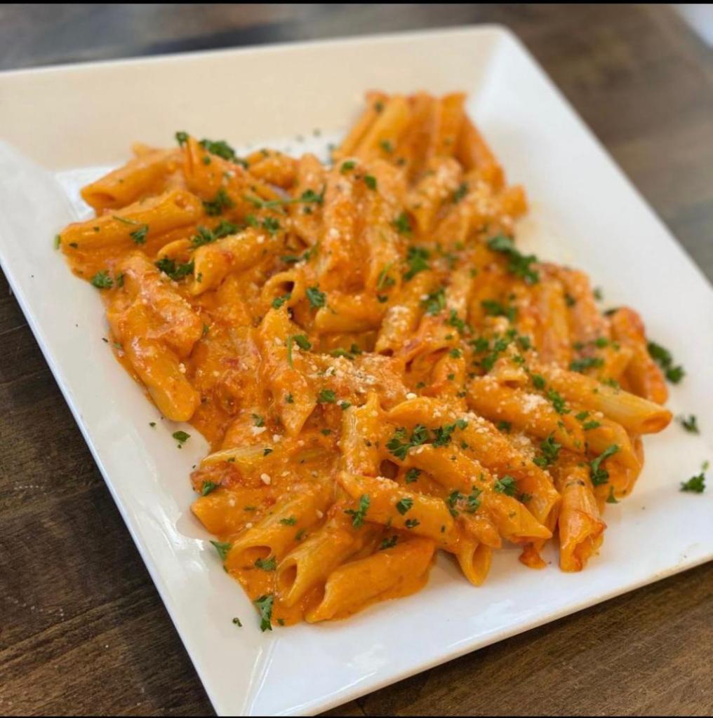 Penne a la Vodka · MOST POPULAR DISH 

Creamy delicious penne pasta in ala vodka sauce

Add your desired protein