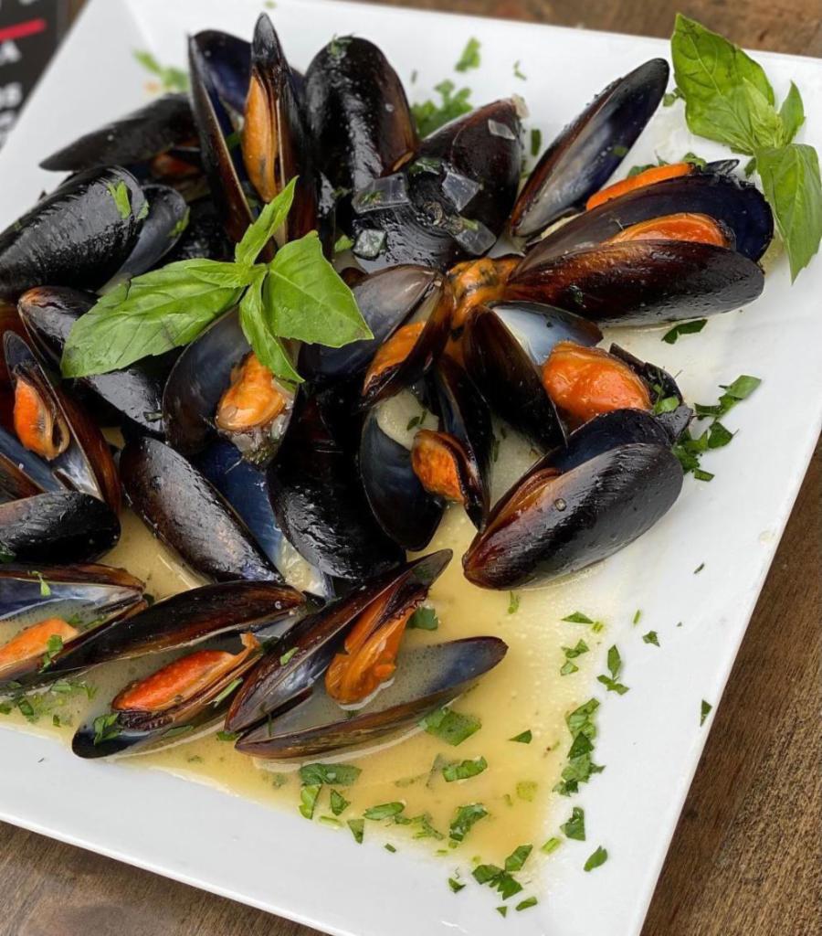 Mussels Marinara · Fresh mussels cooked in our delicious garlic and white wine sauce