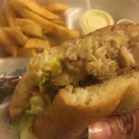 Chicken Sandwich Special* · *Chicken Sandwich comes with 1 Side and 1 Soda*

Lettuce, Our Special Yellow sauce, sauteed ...
