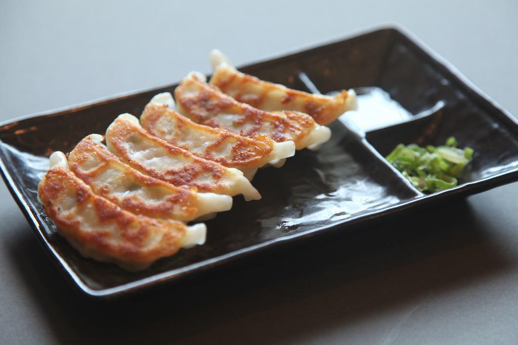 Gyo-za · Choice of pork, shrimp, vegetables or chicken. Pan-fried dumplings.