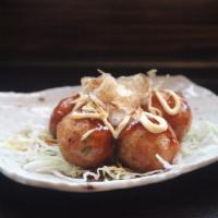 14. Takoyaki · Ball-shaped Japanese snack made with a wheat flour-based batter and filled with minced octop...