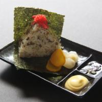 18. Onigiri · Rice ball with dried seaweed.