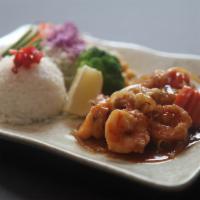 6. Shrimp Teriyaki · Pan-fried shrimp with teriyaki sauce, served with rice, cabbage, corn, broccoli, and oshinko.
