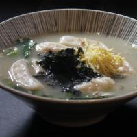 7. Dumpling Soup · Choice of Tamashii or veggie broth and choice of dumpling.