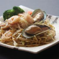 8. Seafood Yaki Ramen · Spicy pan-fried seafood noodles with our homemade soy sauce and vegetables. Topped with shri...