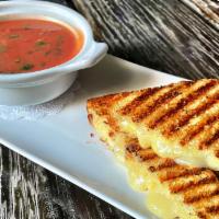 Grilled Cheese & Tomato Soup · coastal cheddar, raclette on challah & homemade tomato soup made w/ sherry wine and heavy cr...