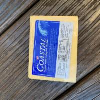 Coastal Cheddar 1/2 LB piece · cows milk cheddar made in England -- NOT AVAILABLE AFTER 8:00 PM