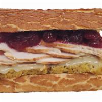 Thanksgiving Turkey & Cranberry Sandwich · Dutch crunch roll, mayonnaise, Dijon mustard, cornbread stuffing, savory gravy, cranberry sa...