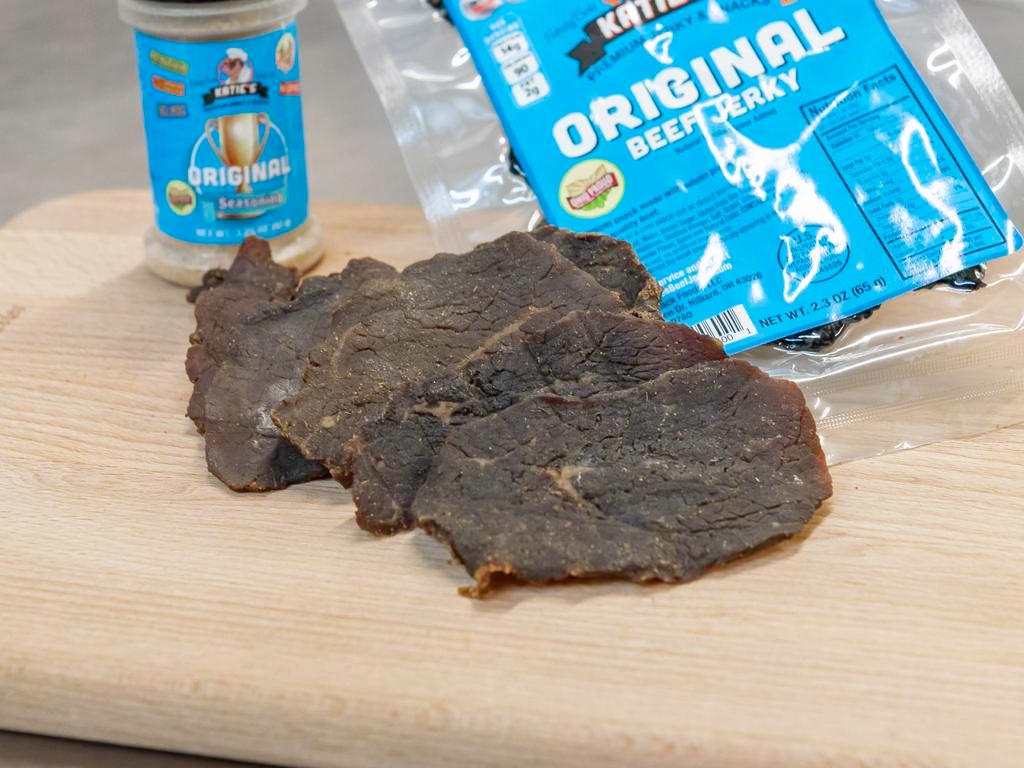 Katie Original Beef Jerky · Katie's original beef jerky is the original recipe that started Katie's business! She developed this amazing recipe 20 years ago, and it’s still her best selling flavor. Rich and savory, this flavor delivers from the first bite to the last morsel. It's also the base flavor for many of the spicier recipes (namely habanero, ghost pepper, and Trinidad scorpion). 2.3 oz.