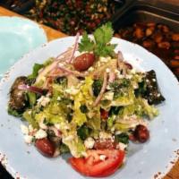 Greek Salad · Served with tahini sauce, hot sauce and pita bread.