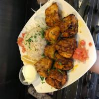 Chicken Kabob · 2 skewers of boneless charbroiled chicken. Served with cabbage salad, hummus and rice.