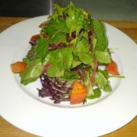 Salade de Mesclum · Mesclum field green salad with balsamic vinaigrette dressing.
