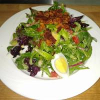 Cobb Salad  · Mesclun field greens, tomatoes, bacon, hard-boiled egg, avocado, crumbled blue cheese and Di...