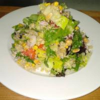 Garden quinoa salad  · White quinoa, chickpeas raw onion, toasted almonds, corn, cucumber, tomatoes, kalamata olive...